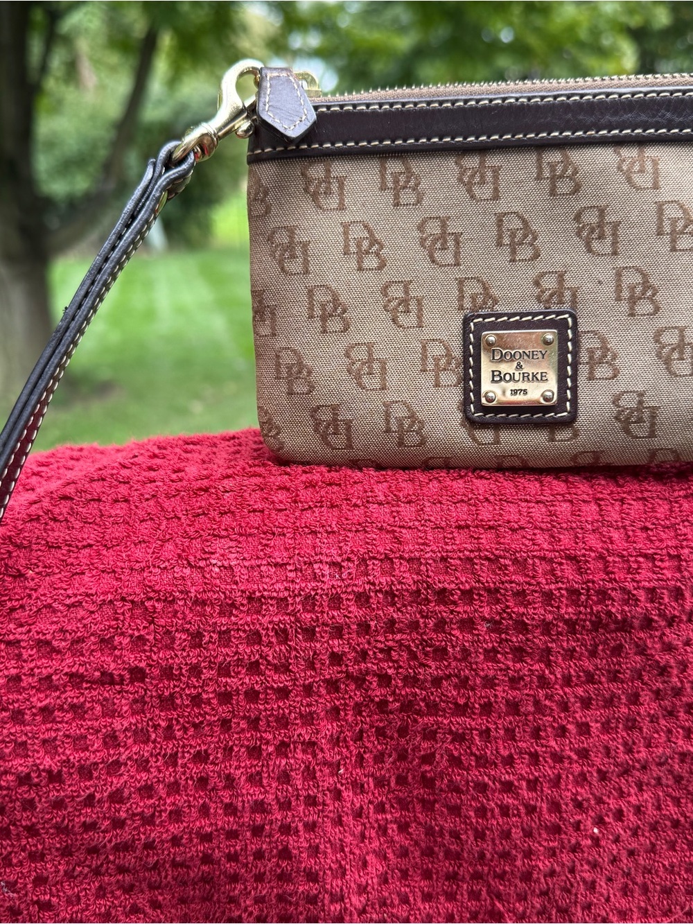Dooney & Bourke Brown Monogram Wristlet Clutch with Gold Hardware